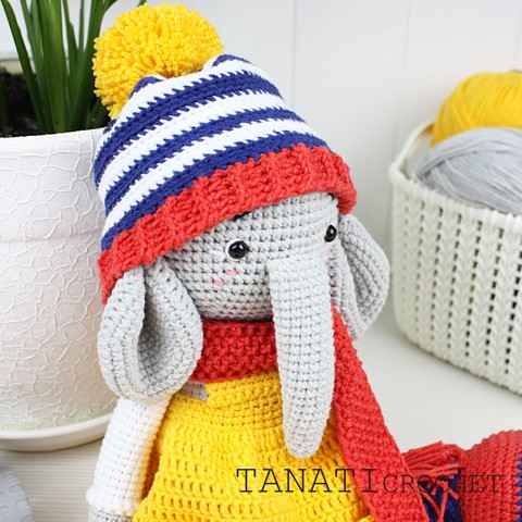 Crochet elephant in clothes