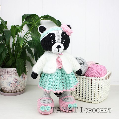 Crochet raccoon in clothes