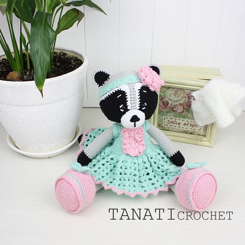 Crochet raccoon in clothes