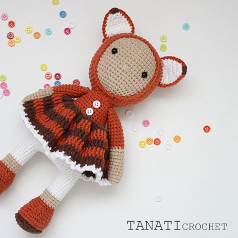 Crochet doll in fox clothes