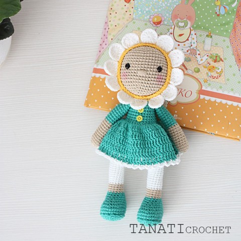 Crochet doll in chamomile clothes