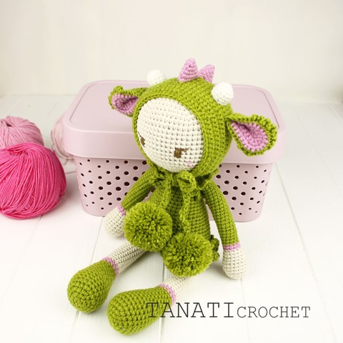 Crochet doll in dragon clothes