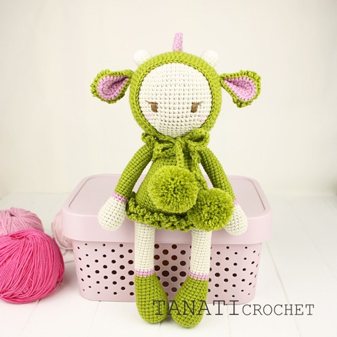 Crochet doll in dragon clothes