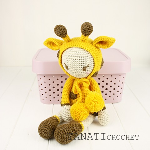 Crochet doll in giraffe clothes