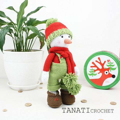 Crochet toy snowman in clothes