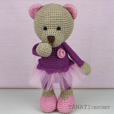 Crochet toy bear in a dress