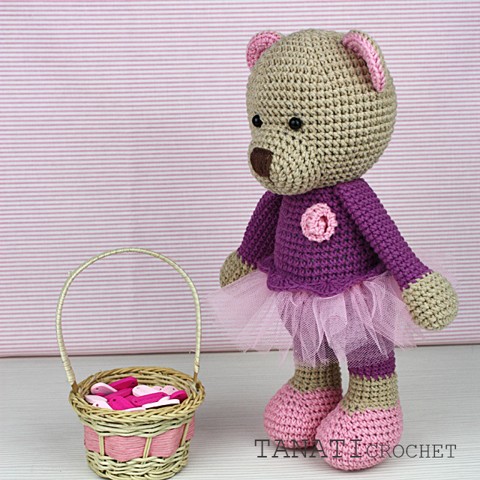 Crochet toy bear in a dress