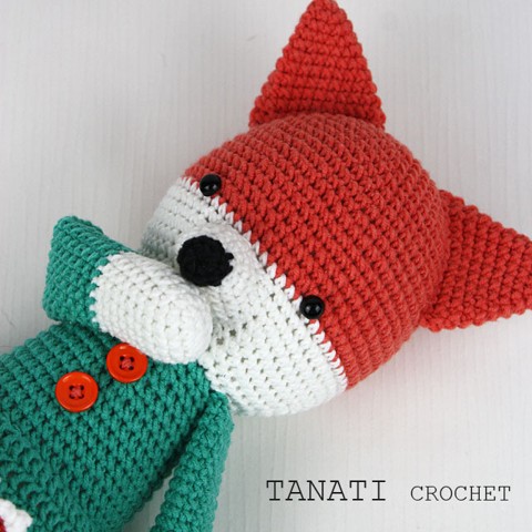 Crochet toy fox in a dress