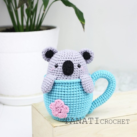 Crochet rattle koala in a cup