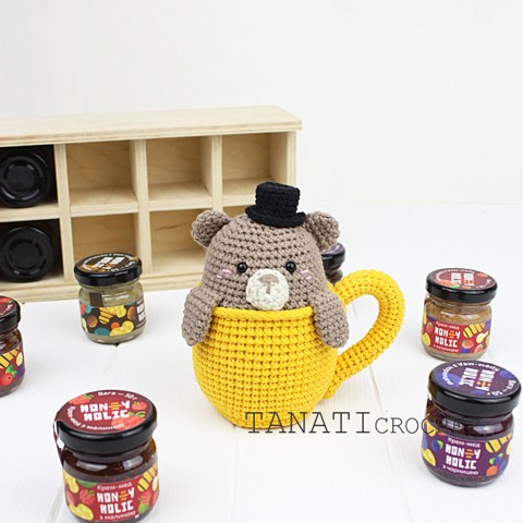 Crochet bear rattle in a cup