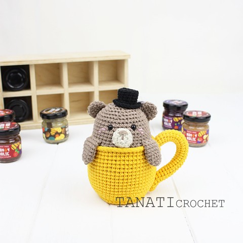 Crochet bear rattle in a cup